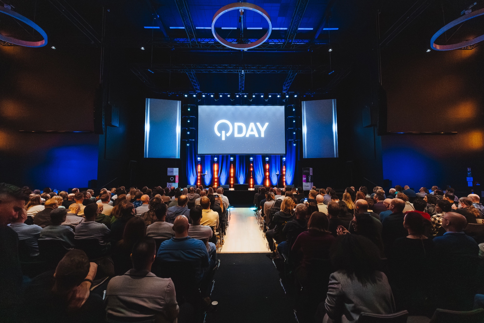 Guests gathered for Q Day in front of the stage